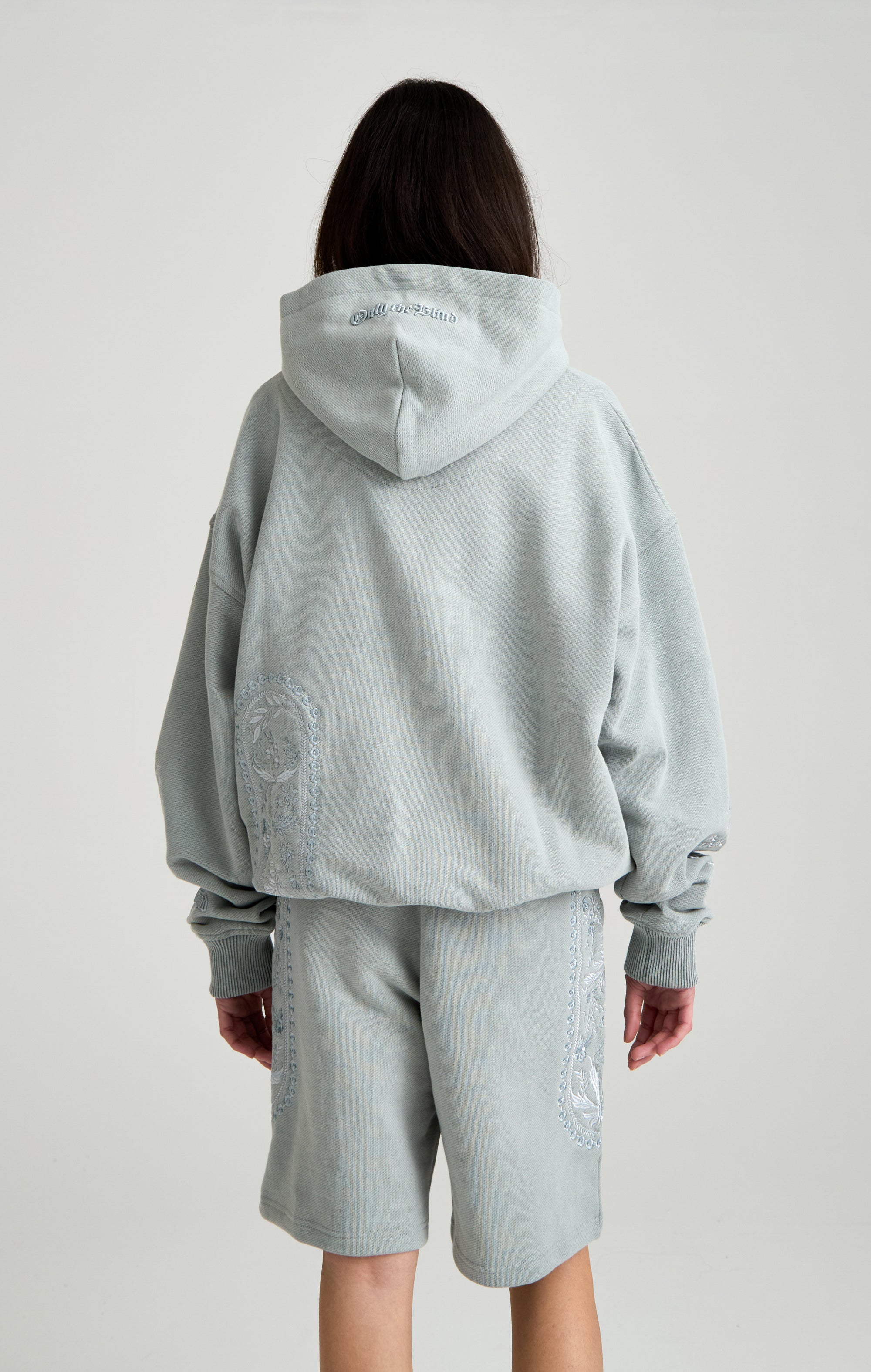 TAPESTRY IN GREY HOOD