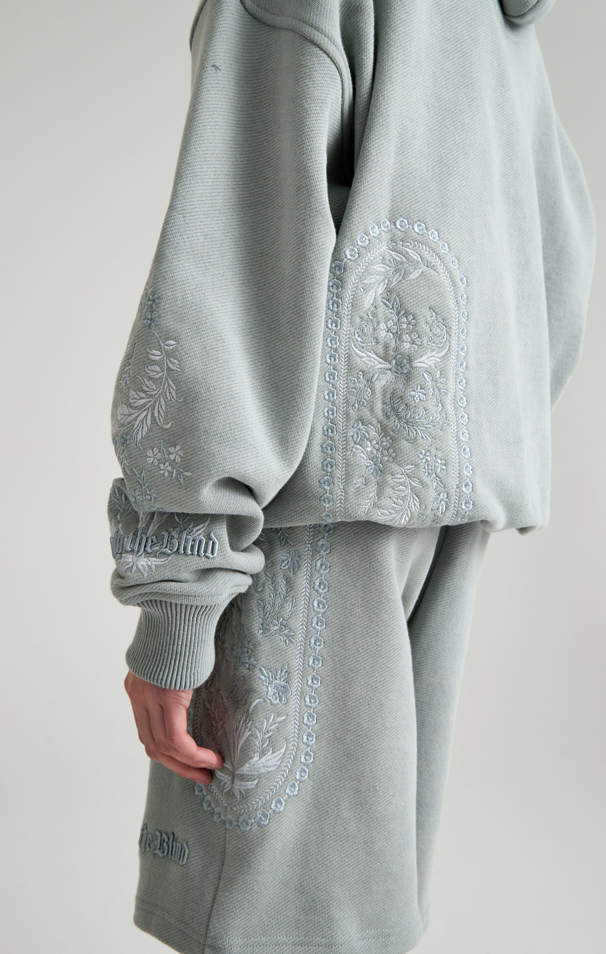 TAPESTRY IN GREY HOOD